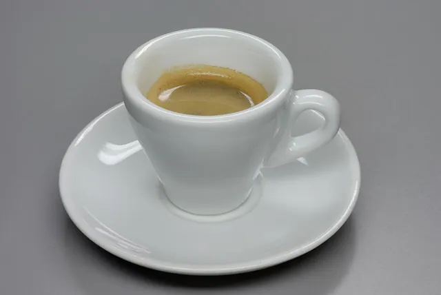 A cup of espresso. From green bean to sealed bag: how a small coffee roastery actually works